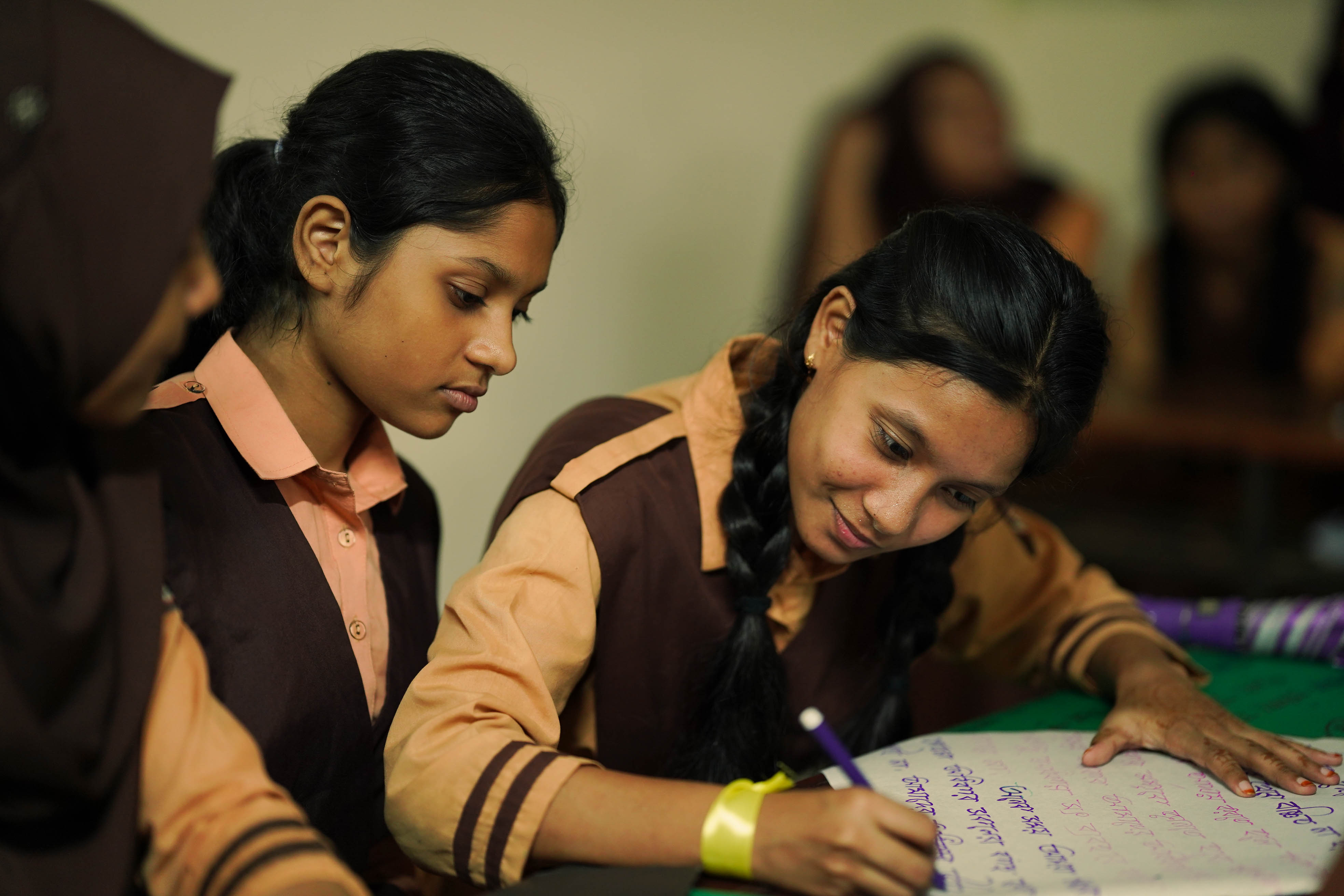 Young leaders collaborating in an energetic workshop